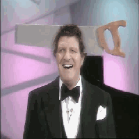 Tommy Cooper with headache